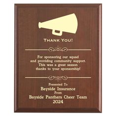 a wooden plaque with an image of a bullhorn on it that says, thank you for