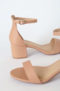 Dress up your casual jeans or complement a cocktail dress with the ever-versatile Lulus Harper Almond Ankle Strap Heels! Smooth, nude faux leather creates a slender toe strap and a single sole silhouette. An essential mid-low block heel provides a comfortable lift and rests below a sturdy heel cup and an adjustable ankle strap with a gold buckle. 2. 5" wrapped block heel. Cushioned insole. Nonskid rubber sole. Upper Material: Synthetic. Sole Material: TPR. Imported. Lulus | Harper Almond Ankle S Beige Heels For Night Out In Spring, Trendy Beige Sandals For Night Out, Elegant Beige Faux Leather Sandals, Beige Ankle Strap Heels In Faux Leather, Beige Ankle Strap Heels For Date Night, Beige Faux Leather Heels For Summer, Beige Heels For Spring Date Night, Beige Heels For Date Night In Spring, Beige Sandals With Heel Strap For Night Out