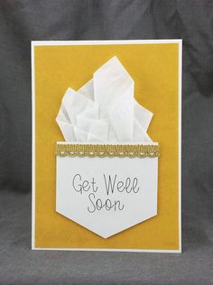 a card that says get weee soon on it with tissue in the pocket and gold trimmings