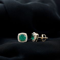 Product Details Experience the enchantment of these captivating Stud Earrings, showcasing a Round Shape Lab Created Emerald at the center, delicately held in a Prong Setting. Surrounding the vibrant created emerald is a dazzling Halo of Moissanite gemstones, adding an extra touch of sparkle. With the inclusion of a Screw Back Closure, these halo earrings ensure a secure fit, providing peace of mind. Whether for a special occasion or everyday wear, these beautiful earrings are guaranteed to elici Gia Certified Green Diamond Earrings For Anniversary, Green Halo Design Fine Jewelry Earrings, Gold Emerald Earrings With Brilliant Cut, Emerald Earrings With Diamond Accents, Emerald Halo Design Fine Earrings, Emerald Halo Design Earrings Fine Jewelry, Emerald Halo Earrings Fine Jewelry, Emerald Halo Earrings In Fine Jewelry Style, Diamond Halo Earrings For May Birthstone