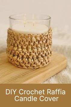 a crochet raffia candle cover on a wooden board with the words diy crochet raffia candle cover