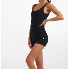 Get Dressed In One Step With This Ultra-Flattering, Rib-Knit Workout Staple. Moisture Wicking Built-In Bra Side Pocket 72% Polyester 28% Elastane Smoke Free Home Ships Same/Next Next Day Casual Sleeveless Elastane Activewear, Black Compressive Activewear For Summer, Compressive Black Activewear For Summer, Chic Sleeveless Activewear For Spring, Compressive Black Tank Top For Summer, Minimal Stretch Solid Sleeveless Activewear, Sleeveless Bodysuit For Workout, Sleeveless Athleisure Bodysuit For Night Out, Athleisure Sleeveless Tank Top For Night Out