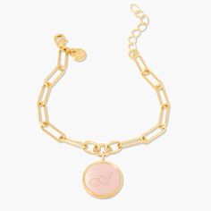 Bold and beautiful, this personalized enamel initial charm bracelet makes a statement with any outfit. Available in three stunning colors, the enamel is personalized with your or a special someone’s initial. The charm hangs elegantly from a modern, elongated link chain. Give as a gift or treat yourself! Available in 14k gold plated brass Enamel filled pendant measures 5/8" 6" elongated link chain with 1" extender Lobster claw closure With engraving this item is FINAL SALE SKU: BYB1106 Initials Charm Bracelet Gift, Personalized Enamel Jewelry For Everyday, Everyday Personalized Enamel Jewelry, Trendy Monogram Jewelry For Personalized Gifts, Trendy Monogrammed Jewelry For Personalized Gifts, Elegant Personalized Enamel Jewelry, S Initial, Initial Charm Bracelet, Enamel Bracelet