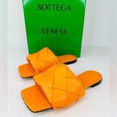 Bottega Veneta -Condition: Brand New Store Display Item With Box + Dust Bag. -All Of Our Items Are 100% Authentic. -Size: Eu 35 - Us 5 -Color: Tangerine -Model: Lido. -Intrecciato Leather Flat Sanda -Material: 100% Lambskin. -Lining: Lambskin. -Open Toe Slip-On Sandals. -Rubber-Injected Leather Outsole. -Made In Italy. -Retails For $1,350.00 -Item Ships Out Within 24 Hours. Designer Woven Leather Evening Sandals, Luxury Orange Evening Sandals, Luxury Leather Sandals With Intrecciato Weave, Luxury Evening Sandals With Intrecciato Weave, Luxury Intrecciato Weave Evening Sandals, Designer Orange Sandals For Party, Luxury Orange Sandals With Removable Insole, Luxury Orange Sandals For Formal Occasions, Designer Leather Sandals With Intrecciato Weave