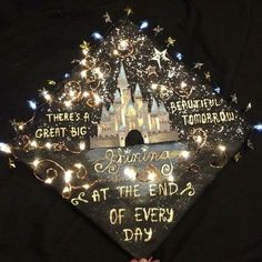 someone is holding up a graduation cap with the castle on it that says, there's a great big tomorrow at the end of every day