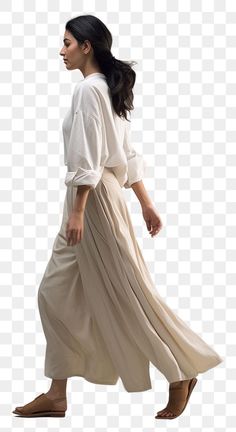 a woman walking down the street wearing a white shirt and long skirt, hd png