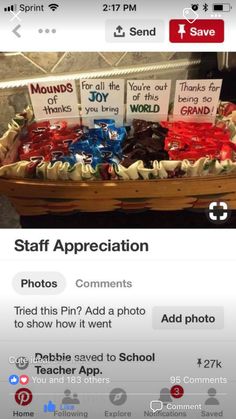 a basket filled with lots of candy sitting on top of a table