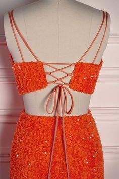 This Two Piece Orange Sequin dress features double straps and a mermaid skirt with a side slit, for an unforgettable evening look. Item #NP1041 Color: Orange Material: Sequin Silhouette: Two Piece Sleeves: Double straps Embellishment: Mermaid skirt with side slit Back: Lace-up back Length: Full length Fully lined: Yes Built-in bra: Yes True to size. Made in China. Dresses are usually packed inside out for protection. Hand wash Orange Mermaid, Prom Dress Pictures, Sweep Train Prom Dress, Long Formal Dress, Prom Dresses With Pockets, Prom Dresses Two Piece, Lace Prom Dress, Pink Petals, Mermaid Skirt