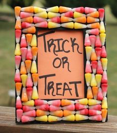 a trick or treat frame made out of candy