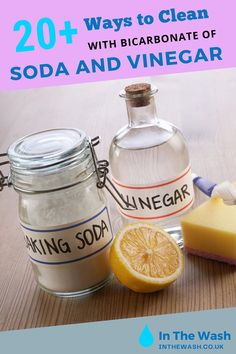 two bottles with soap and vinegar sitting next to each other