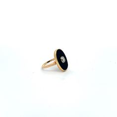 This unique 14k yellow gold ring showcases a one-of-a-kind onyx stone and diamond, perfect for a size 6 fit. Modern 14k Gold Enamel Round Ring, Modern Round Enamel Ring In 14k Gold, Diamond Enamel Ring With Black Enamel, Timeless Onyx Gemstone Rings, Luxury Onyx Round Signet Ring, 14k Gold Oval Enamel Ring For Formal Occasions, Luxury Onyx Diamond Ring For Formal Occasions, Oval 14k Gold Enamel Ring For Formal Occasions, Formal Oval Enamel Ring In 14k Gold