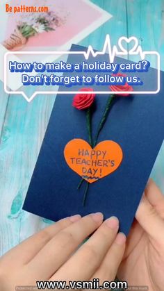 someone is holding up a card that says happy teacher's day with roses on it