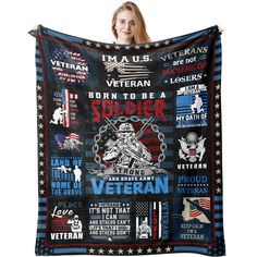 a woman is holding up a blanket with the words soldier and american flags on it