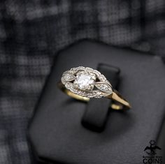 * Metal: 14k Yellow Gold * Weight: 2.9 grams * Ring Size: 9.25 *Experience elegance and timeless beauty with this 14k yellow and white gold 0.45 CTW diamond ring showcasing a vintage Art Nouveau raised setting. Perfect for the modern romantic, this stunning piece exudes class and sophistication, adding a hint of sophistication to any ensemble. Diamond Ring Vintage, Gold Bullion, Rare Coins, Ring Vintage, Rings Statement, Timeless Beauty, Vintage Rings, Yellow White, Statement Rings