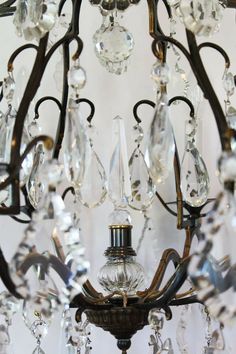 a chandelier with crystal drops hanging from it