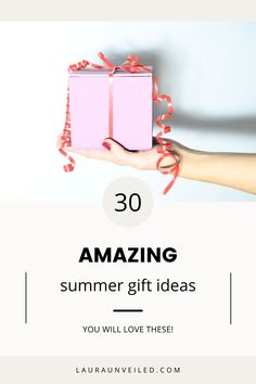 a person holding two pink gift boxes with red bows on them and the words 30 amazing summer gift ideas you will love these