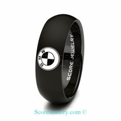 a black and white ring with the word store center on it's side, in front of a white background