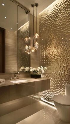 a modern bathroom with gold foil on the wall