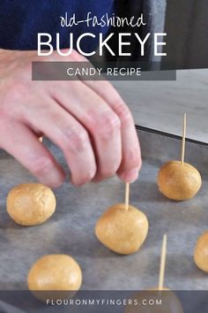 someone is picking up some food from a pan with toothpicks on it and the words, old - fashioned buckeye candy recipe