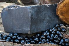 some black rocks and a piece of wood