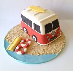 the cake is shaped like a bus and has a life preserver on it's side