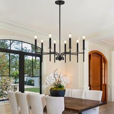 This sturdy and stylish farmhouse chandelier is ideal for a dining room chandelier, or a centerpiece in your entryway modern chandelier for foyer. Designed for versatility, chandelier's adjustable poles (24 to 72 inches) and flexible canopy make it perfect as entryway chandeliers for high ceilings, and also suitable for living room chandelier in spaces with lower ceilings, including sloped surfaces. This chandelier light fixture integrates seamlessly into any room, providing a adaptable solution Chandelier For High Ceiling, Chandeliers For High Ceilings, Modern Chandelier Foyer, Chandelier For Foyer, Entryway Chandeliers, Chandeliers Black, Stylish Farmhouse, Entryway Chandelier, Entryway Modern