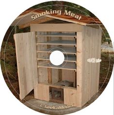 a cd cover with a small wooden cabinet in the shape of a smoker oven