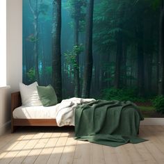 a bedroom with a green forest wall mural