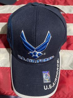 Blue Air Force cap with winged logo and blue crest embroidered on right side. Nice quality and Free Shipping Blue Hat With Logo Patch And Curved Visor, Blue Hats With Logo Patch And Curved Visor, Blue Curved Visor Hat With Logo Patch, Blue Visor Hat With Logo Patch, Blue Baseball Cap With Embroidered Logo Visor, Blue Sports Fitted Hat With Logo Patch, Blue Outdoor Hat With Embroidered Logo, Blue Sports Hat With Embroidered Logo, Blue Fitted Hat With Logo Patch For Sports