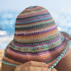 Introducing our fabulous Multi-Colored Crochet Bucket Hat, a groovy accessory that adds a touch of style to any outfit. Handcrafted with love and attention to detail, this hat is a true statement piece. Whether you're a fashion enthusiast or simply looking for a unique Mother's Day gift, this hat is the perfect choice. Featuring a delightful blend of vibrant colors, this hat exudes a playful and eye-catching appeal. The intricate crochet work showcases the craftsmanship and dedication that goes Bohemian Crochet Hat For Beach, Festival Crochet Hat, Bohemian Knitted Summer Hat, Bohemian Knitted Sun Hat For The Beach, Multicolor Sun Hat Cap One Size Fits Most, Multicolor One Size Fits Most Sun Hat Cap, Multicolor One Size Fits Most Sun Cap, Multicolor Cap Sun Hat One Size Fits Most, Playful Multicolor Sun Hat For Beach