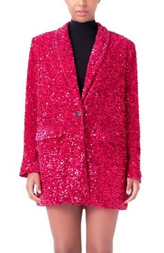 Strong shoulders frame this longline velvet blazer designed in a one-button silhouette with lustrous allover sequins. One-button closure Shawl collar Front-flap pockets Lined 100% polyester Hand wash, dry flat Imported Glamorous Notch Lapel Outerwear For Party, Glamorous Party Blazer With Notch Lapel, Glamorous Notch Lapel Blazer For Party, Fall Notch Lapel Blazer With Sequins, Pink Glamorous Evening Outerwear, Glamorous Notch Lapel Outerwear For Night Out, Party Outerwear With Embellished Notch Lapel, Glamorous Pink Evening Outerwear, Glamorous Pink Sequined Outerwear