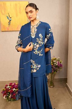 Blue kurta with thread embroidery in floral pattern. Paired with lehenga and dupatta. - Aza Fashions Indigo Sets With Dupatta For Navratri, Indigo Navratri Set With Dupatta, Blue Bollywood Straight Kurta Set, Blue Unstitched Saree Sets, Indigo Straight Kurta Designer Set, Blue Unstitched Set With Traditional Drape, Unstitched Blue Sets In Traditional Drape, Blue Straight Kurta Set For Diwali, Blue Traditional Drape Sets For Eid