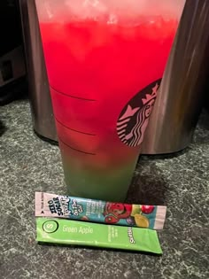 a starbucks drink next to an energy bar