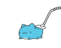 a blue cat laying down with a toothbrush in it's mouth