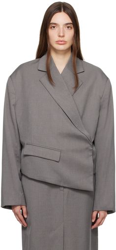 Recycled polyester-blend twill blazer. · Asymmetric wrap construction · Notched lapel · Concealed offset button closure · Flap pockets · Padded shoulders · Four-button surgeon's cuffs · Fully lined Supplier color: Dark gray Asymmetrical Single-breasted Outerwear For Work, Asymmetrical Spring Business Blazer, Asymmetrical Blazer For Business In Spring, Spring Asymmetrical Business Blazer, Tailored Asymmetrical Outerwear For Work, Birger Christensen, Womens Blazers, Blazers For Women, Outerwear Women