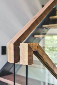 a close up view of a wooden railing