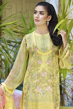 Beautiful Crinkle chiffon dress for party wear. Yellow color dress is embellished with thread embroidered crinkle chiffon shirt.Over all dress is embellished with multi color thread embroidery by giving a lavish look to outfit. Trouser: Pakistani crinkle chiffon dress is paired with raw silk trouser in matching color embellished with embroidered patches. Dupatta: Embroidered crinkle chiffon dupatta is fully embellished with thread embroidery and side embroidered borders. Detailed Description: SK Gold Georgette Dress For Reception, Semi-stitched Gold Dress With Floral Embroidery, Yellow Dupatta With Dabka Work For Reception, Gold Floral Embroidered Dress For Reception, Designer Embellished Gold Dress, Summer Reception Dupatta In Georgette, Yellow Kurta With Resham Embroidery For Reception, Designer Gold Embellished Dress, Gold Embellished Designer Dresses