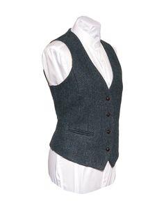 A must for Ladies who love trends, shape and function in their clothing.This Irish designed piece is trendy yet functional. This garment is shaped to combine traditional tailoring with a contemporary edge.This tweed waistcoat is a visually stunning key piece that is made for any occasion.The herringbone blue tweed has flecks of color that give it a unique oceanic feel. Wear with denim for a more casual look or with a skirt for a more formal occasion. The Celtic Tweed ladies collection of tweed w Fitted Herringbone Vest For Fall, Fitted Tweed Vest For Winter, Fitted Tweed Vest For Work, Fitted Tweed Vest With Herringbone Pattern, Fitted Tweed Vest For Fall, Waistcoat For Women, Herringbone Vest, Waistcoat Woman, Wool Waistcoat