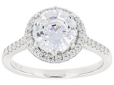 Charles Winston for Bella Luce® white diamond simulant 3.47ctw round rhodium over sterling silver Scintillant Web Cut® ring. Measures approximately 0.81"L x 0.44"W and is not sizable. The diamond equivalent weight is 2.10ctw. Classic White Halo Ring With Round Stone, White Cubic Zirconia Halo Ring, Formal White Halo Ring With Round Stone, Classic White Cubic Zirconia Halo Ring, White Halo Ring With Round Stone For Formal Occasions, White Halo Ring With Brilliant Cut, Formal White Cubic Zirconia Halo Ring, Dazzling White Halo Ring With Round Cut, White Vvs Clarity Halo Ring