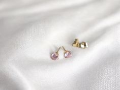 ∙ ∙ P I N K ∙ S T U D ∙ E A R R I N G S ∙ ∙ Made with the following: 4mm - 14K Gold Filled Pink Cubic Zirconia Earrings 14K Gold Filled Earnut The listing is for 1 pair of earrings. Due to hygienic reasons, I do NOT accept returns or exchanges on earrings. ∙ ∙ H O W ∙ T O ∙ O R D E R ∙ ∙ Please select add to cart.   Please visit our FAQs in the about section for sizing and jewelry care. https://www.etsy.com/shop/SugarFairyJewelry ∙ ∙ P R O D U C T I O N ∙ T I M E ∙ ∙ All items are made to order Kids Jewelry Gold, Stud Earrings Women, Schmuck Gold, Pink Stud Earrings, Pink Studs, Fairy Jewelry, Gold Vermeil Jewelry, Stud Earrings Gold, Jewelry Minimalist