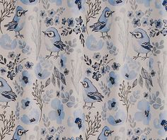 a shower curtain with blue flowers and birds on it