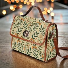 "Retro Olive Green floral Canvas Satchel bag, Cute women boho crossbody purse, cute vegan leather strap hand bag, cottage hippies boho gift  >>PRODUCT INFO<< * 18.94 Oz. Made from high-grade waterproof canvas, durable, water-resistant. * Can be used as a nice laptop storage bag, business briefcase, college school bag, leisure travel tote bag, crossbody messenger bag, card wallet case, etc. * Two interior pockets for small items one zipper pocket. * Removable and adjustable shoulder strap. * The Brown Shoulder Bag Gift For Spring, Brown Shoulder Bag As Spring Gift, Spring Satchel Shoulder Bag As Gift, Spring Season Shoulder Bag Satchel As A Gift, Spring Gift Shoulder Satchel, Spring Shoulder Satchel As Gift, Spring Gift Leather Shoulder Bag, Spring Leather Shoulder Bag Gift, Brown Floral Print Crossbody Shoulder Bag