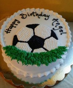 a birthday cake with a soccer ball on it