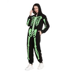 a woman in a skeleton costume posing for the camera with her hands on her hips