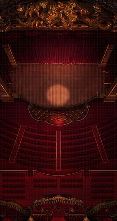 an overhead view of a theater with red seats