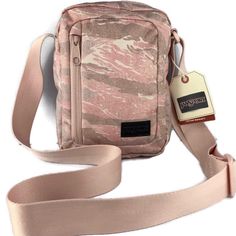 Jansport Weekender Ls Mini Bag - Crossbody Pack | Rose Smoke Tiger Camo New With Tag *Comes From A Smoke And Pet Free Environment * Please Refer To Pictures Are They Are Part Of Description * If You Have A Any Question Please Comment Below And I'll Be Glad To Answer Them. *Feel Free To Make Offer * Do Not Accept Trades Casual Pink Shoulder Bag For Outdoor, Casual Pink Outdoor Bag, Pink Shoulder Bag With Adjustable Strap For Outdoor Activities, Pink Bags With Cell Phone Pocket For Outdoor Activities, Sporty Pink Shoulder Bag For Outdoor, Pink Crossbody Shoulder Bag For Outdoor, Functional Pink Shoulder Bag For Outdoor, Black Jansport, Black Fanny Pack