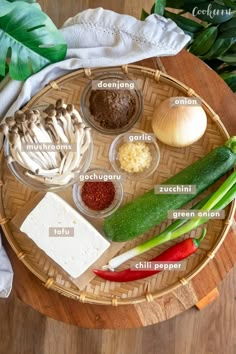 an arrangement of ingredients on a bamboo tray