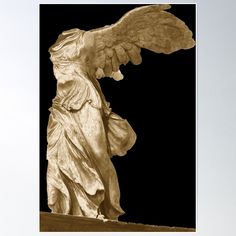 an angel statue is shown against a black background