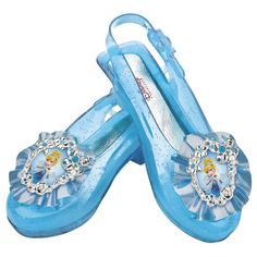 These pretty, powder blue, glass-like shoes are a great fit for a little princess. These beautiful slippers catch the light with glistening sparkles. They're a must have addition to your little princess's Cinderella Halloween costume. They're also fun and fancy dress-up accessories! These shoes each feature a cameo of Cinderella on each toe. Adjustable strap to fit various sizes.Special Shipping Information: This item ships separately from other items in your order. Imported. Cinderella Costume Kids, Cinderella Sparkle, Cinderella Halloween Costume, Edgy Boots, Disney Princess Costumes, Beautiful Slippers, Cinderella Costume, Disney Princess Cinderella, Cinderella Disney