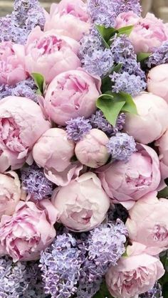 a bouquet of pink and purple flowers